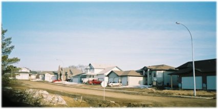 Brand new street of houses just past Sunset Manor