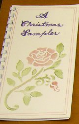 A Christmas Sampler with a stenciled rose