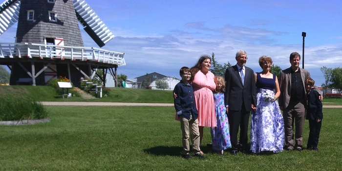 Ernie and Dori with Ernie's daughter Beth and her family - with part of windmill